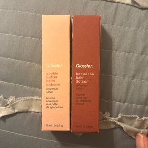 Hot cocoa and cookie butter balm dotcom from glossier. Never used